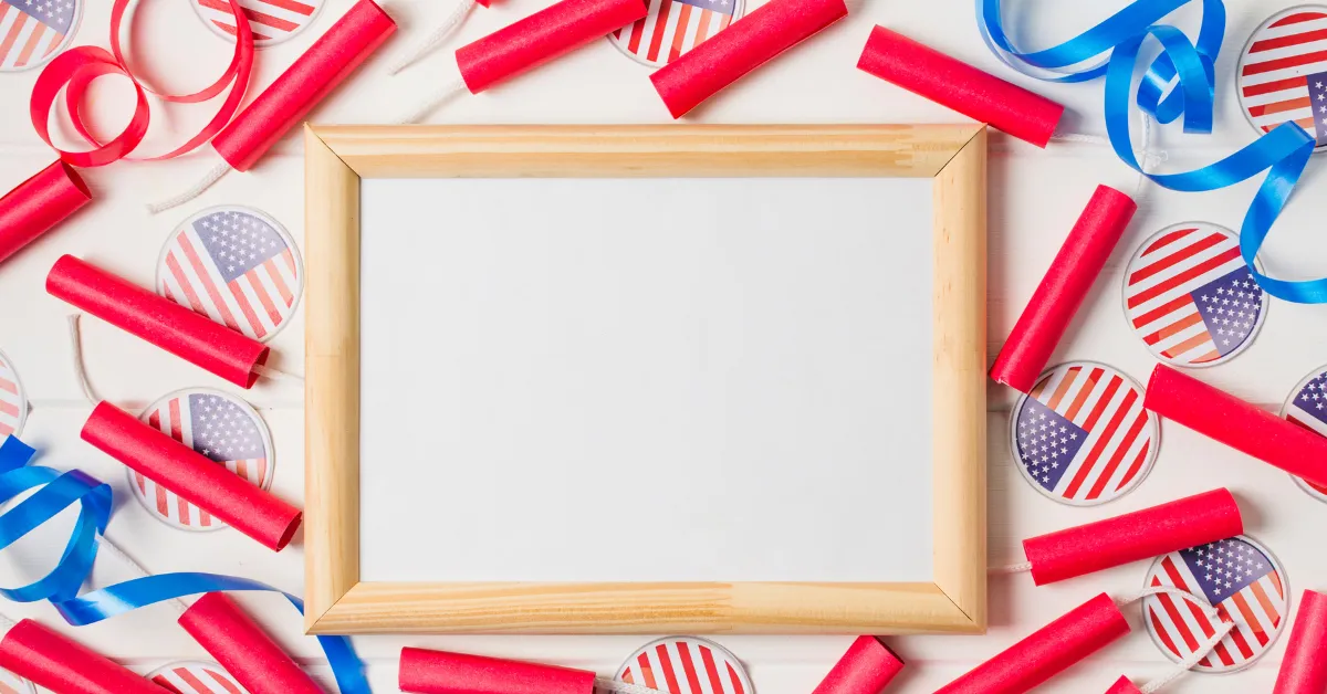 Elf on the shelf ideas printables with blank frame, red ribbons and patriotic decorations flat lay.